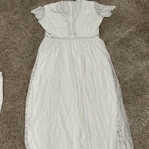 Long white dress worn for bridal shower
